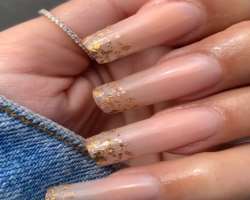 Dutch is a huge fan of nail arts and is often seen with stylish nails in most of her posts.